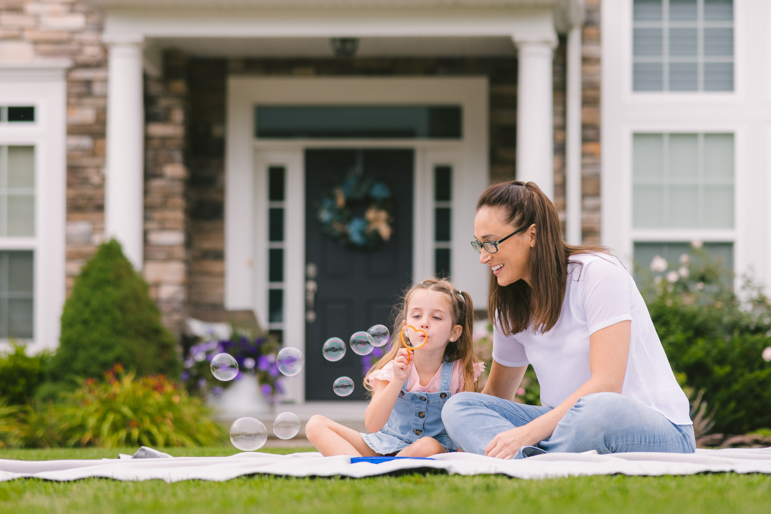 women and child in the yard